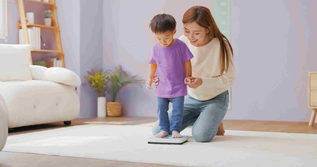 menimbang berat badan anak